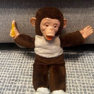 Vintage Brown and White Plush Monkey with Banana